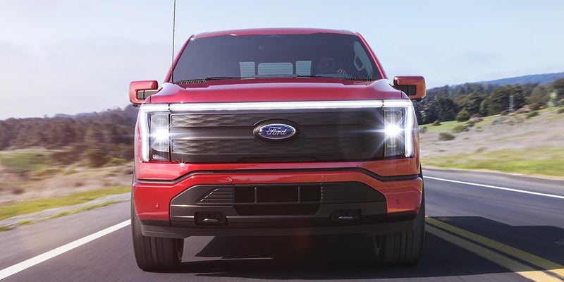 Ford F-150 Lightning driving on road