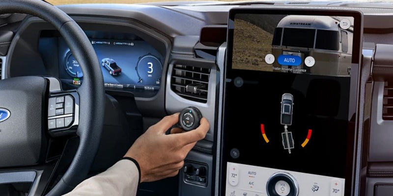 Woman operates touchscreen interface