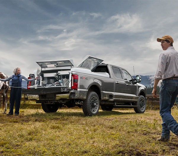 Four Stars Ford in Jacksboro TX Ford SuperDuty with a full truck bed on a ranch